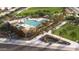 Aerial view of community amenities including pool and playground at 9987 W Verde Ln, Avondale, AZ 85392