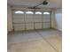 Spacious two-car garage with automatic opener and ample storage space at 9987 W Verde Ln, Avondale, AZ 85392