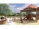 Community playground with play structures and shaded areas for children at 9987 W Verde Ln, Avondale, AZ 85392