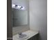 Bathroom with a vanity and a large mirror at 11022 N 41St Ave, Phoenix, AZ 85029