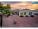 Backyard view of home with gravel and desert plants at 12840 W Santa Ynez Dr, Sun City West, AZ 85375