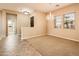 Dining room with carpeted flooring and natural light at 12840 W Santa Ynez Dr, Sun City West, AZ 85375