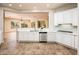 Kitchen with stainless steel appliances and island at 12840 W Santa Ynez Dr, Sun City West, AZ 85375