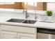 Kitchen sink and countertop with modern faucet at 12840 W Santa Ynez Dr, Sun City West, AZ 85375