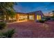 Backyard view of home with patio and landscaping at 12840 W Santa Ynez Dr, Sun City West, AZ 85375
