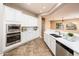 Eat-in kitchen with stainless steel appliances at 12840 W Santa Ynez Dr, Sun City West, AZ 85375