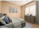 Bright bedroom with neutral walls and a dresser at 12840 W Santa Ynez Dr, Sun City West, AZ 85375