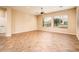 Bright living room featuring tile floors and ceiling fan at 12840 W Santa Ynez Dr, Sun City West, AZ 85375