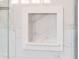 Built-in shower shelf for toiletries and accessories at 12840 W Santa Ynez Dr, Sun City West, AZ 85375