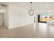 Bright dining room with tile floor and modern chandelier at 2644 E Rosario Mission Dr, Casa Grande, AZ 85194