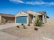 Single-story home with teal garage door at 2644 E Rosario Mission Dr, Casa Grande, AZ 85194