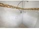 Shower stall with tile surround and a built in shelf at 4026 W Rovey Ave, Phoenix, AZ 85019