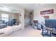 Bedroom with a home office and mirrored closet at 40350 W Art Pl, Maricopa, AZ 85138