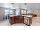 Modern kitchen with granite island and stainless steel appliances at 40350 W Art Pl, Maricopa, AZ 85138