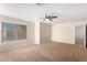 Carpeted bedroom with window and ceiling fan at 3625 S Payton --, Mesa, AZ 85212