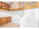 Laundry room with washer, dryer, and built-in cabinets at 3625 S Payton --, Mesa, AZ 85212