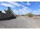 Gravel driveway with desert landscaping and a view of a neighboring property at 423 S Arroya Rd, Apache Junction, AZ 85119