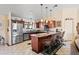 Spacious kitchen featuring stainless steel appliances and a large island with seating at 20132 W Medlock Dr, Litchfield Park, AZ 85340