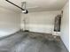 Garage interior with water heater and door to house at 1721 W Pollack St, Phoenix, AZ 85041