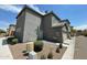 Gray two-story home with attached garage and landscaping at 1721 W Pollack St, Phoenix, AZ 85041