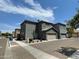 Two-story home with gray exterior, attached garage, and driveway at 1721 W Pollack St, Phoenix, AZ 85041