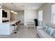 Open living space with kitchen, dining area, and living room at 2511 W Queen Creek Rd # 417, Chandler, AZ 85248