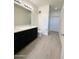 Modern bathroom with double vanity, shower, and toilet at 2511 W Queen Creek Rd # 417, Chandler, AZ 85248