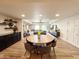 Open concept dining area with a wooden table at 2511 W Queen Creek Rd # 417, Chandler, AZ 85248