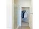 Bathroom with glass shower and walk-in closet at 2511 W Queen Creek Rd # 417, Chandler, AZ 85248