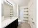 Clean bathroom with tub shower and striped curtain at 2511 W Queen Creek Rd # 417, Chandler, AZ 85248