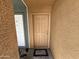 Private entryway with a door to the unit and tiled flooring at 2616 E Southgate Ave # 2, Phoenix, AZ 85040