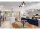 Open concept kitchen and living area, featuring modern appliances and a comfortable couch at 2520 E Flower St, Phoenix, AZ 85016