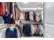 Spacious walk-in closet with ample hanging space and shelving at 2520 E Flower St, Phoenix, AZ 85016