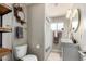 Updated bathroom with double vanity, shower, and modern fixtures at 2520 E Flower St, Phoenix, AZ 85016