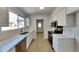 Bright kitchen with stainless steel appliances and quartz countertops at 3013 W Hearn Rd, Phoenix, AZ 85053