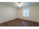 Bedroom with ceiling fan and window with blinds at 285 W Santa Gertrudis Trl, San Tan Valley, AZ 85143