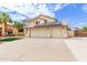 Three-car garage with solar panels on the roof at 15954 N 162Nd Ln, Surprise, AZ 85374