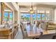 Elegant dining room with large windows and mountain views at 11377 E Diamond Cholla Dr, Scottsdale, AZ 85255