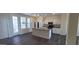 Modern kitchen with island, opens to dining area at 639 W Pepper Pl # 109, Mesa, AZ 85201