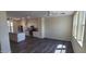 Open concept kitchen and living area with modern appliances at 639 W Pepper Pl # 109, Mesa, AZ 85201