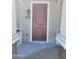 Modern brown front door with number 102 at 639 W Pepper Pl # 102, Mesa, AZ 85201