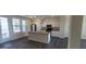 Modern kitchen with island and stainless steel appliances at 639 W Pepper Pl # 107, Mesa, AZ 85201