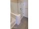 Bathroom with a walk-in shower and gray tile floor at 639 W Pepper Pl # 107, Mesa, AZ 85201