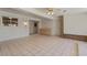 Sunroom with tiled floor, brick walls, and access to exterior at 17210 N Foothills Dr, Sun City, AZ 85373