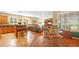 Open kitchen and living area with hardwood floors at 6574 S Crestview Dr, Gilbert, AZ 85298
