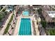 Lap pool and leisure pool with plenty of lounge chairs at 6574 S Crestview Dr, Gilbert, AZ 85298