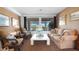 Bright Gathering room with comfortable seating and pool view at 6574 S Crestview Dr, Gilbert, AZ 85298