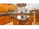 Spacious kitchen with island and stainless steel appliances at 6574 S Crestview Dr, Gilbert, AZ 85298