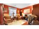 Home office with comfortable seating and built-in shelving at 6574 S Crestview Dr, Gilbert, AZ 85298