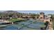 Community tennis courts with surrounding landscaping at 6574 S Crestview Dr, Gilbert, AZ 85298